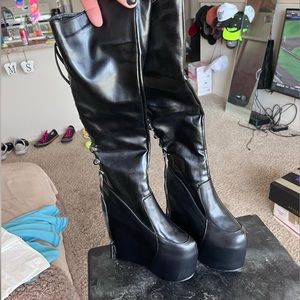 Knee high wedge boots